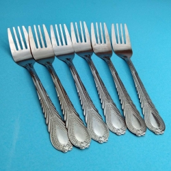 কাটা চামুচ (XXEX)